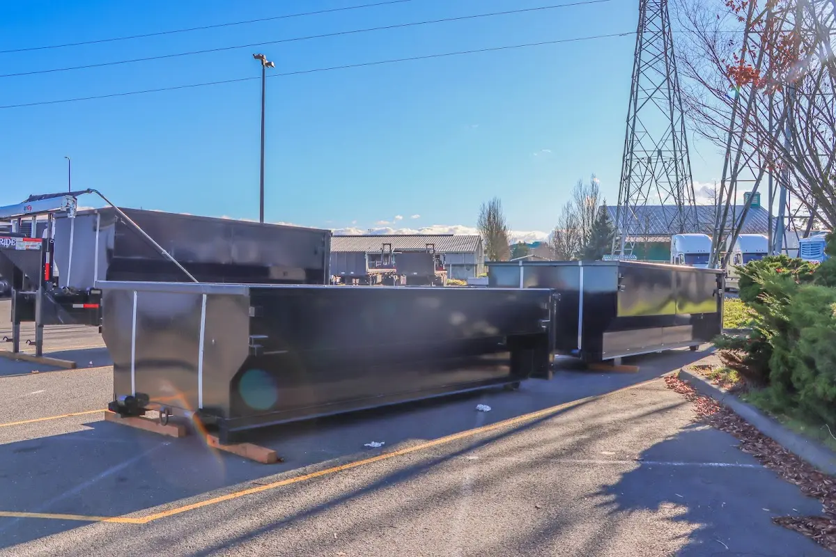 Roll-off dumpster ready for waste disposal at job site for Concrete Dumpster Rental in Lehighton